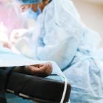 A surgeon operating on a patient (Photo: Anna Shvets)